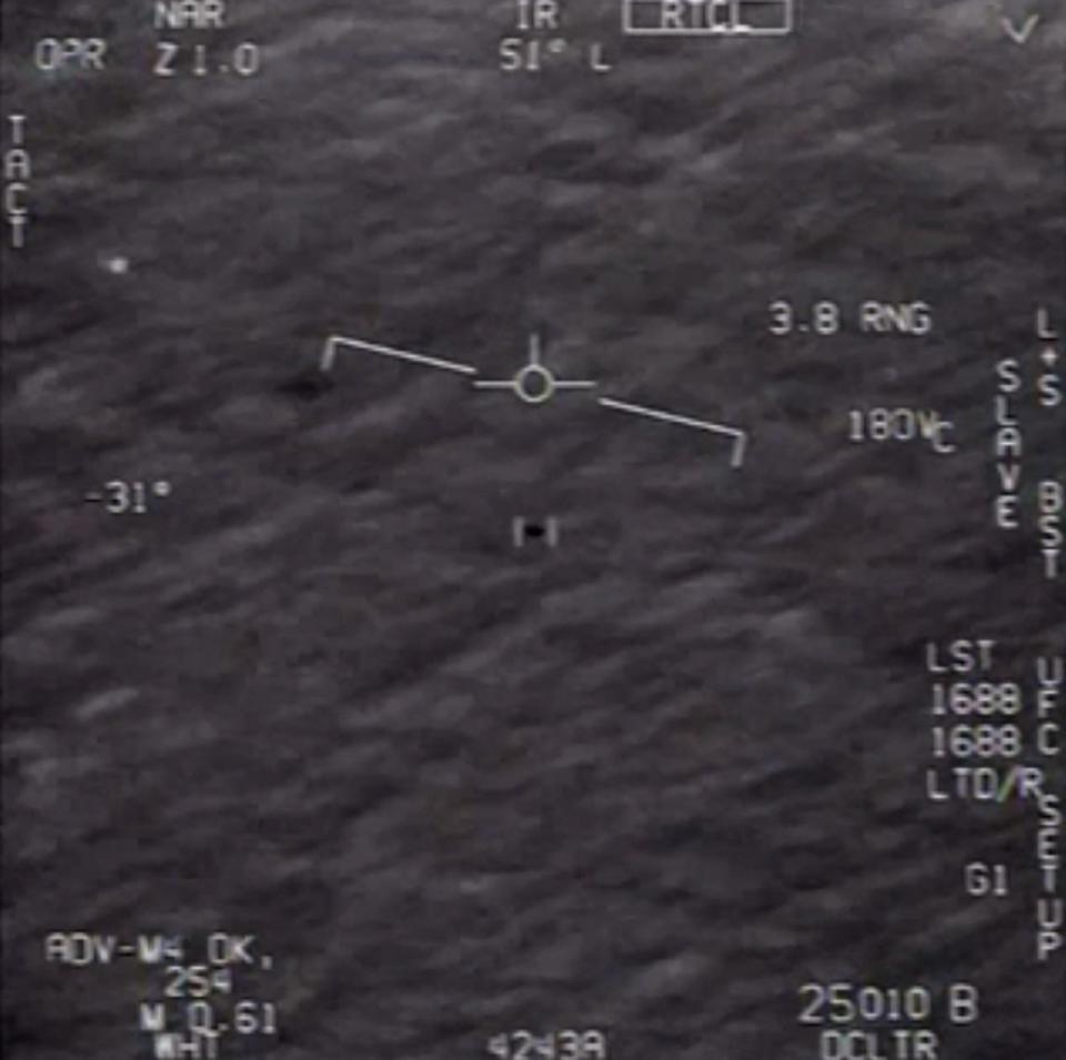 This file video grab image by US Department of Defense shows part of an unclassified video taken by Navy pilots that have circulated for years showing interactions with “unidentified aerial phenomena”. (DoD/AFP via Getty Images)