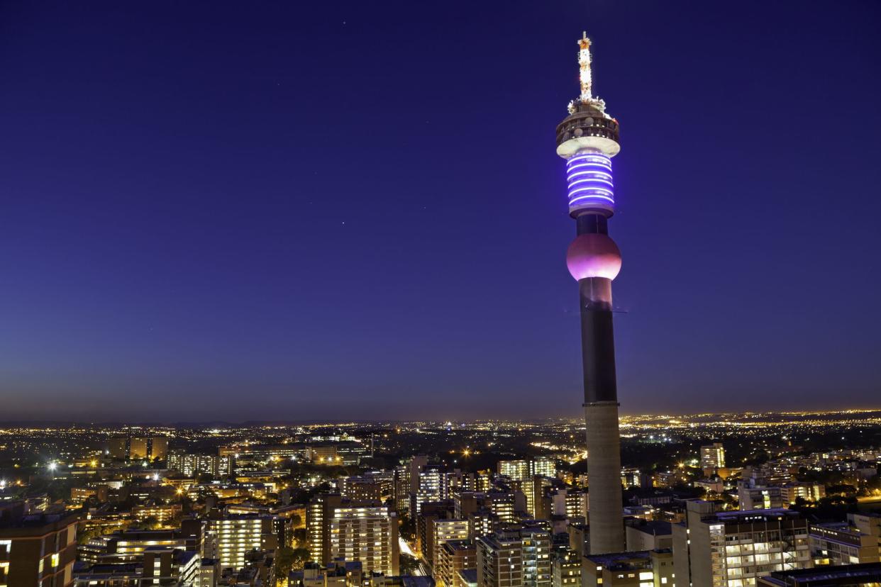 Hillbrow tower in Johannesburg city, seen at sunset towards the northern suburbs. A highly urban populated area in Johannesburg.