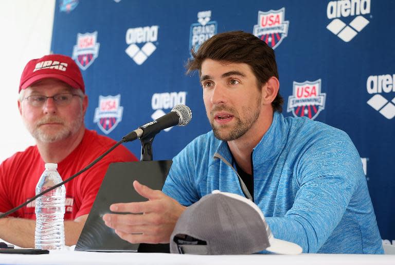 Michael Phelps and coach Bob Bowman at a press conference for the Arena Grand Prix at the Skyline Aquatic Center in Mesa, Arizona on April 23, 2014
