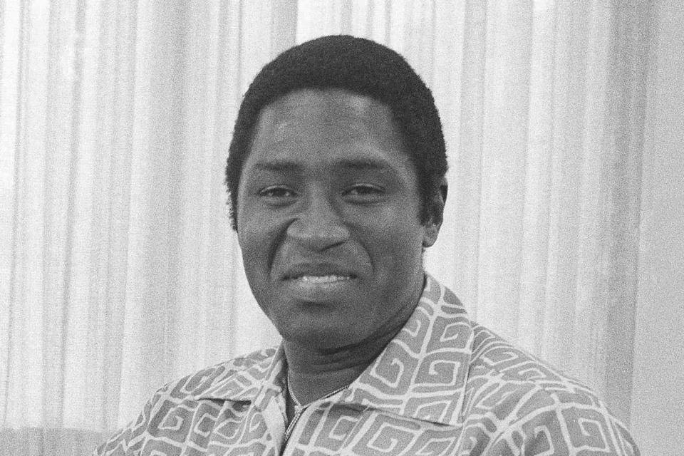 FILE - Willis Reed of the New York Knicks listens to reporters' questions during a news conference at the NBA offices in New York, July 21, 1972. Willis Reed, who dramatically emerged from the locker room minutes before Game 7 of the 1970 NBA Finals to spark the New York Knicks to their first championship and create one of sports’ most enduring examples of playing through pain, died Tuesday, March 21, 2023. He was 80. Reed's death was announced by the National Basketball Retired Players Association, which confirmed it through his family. (AP Photo/Harry Harrison, File)