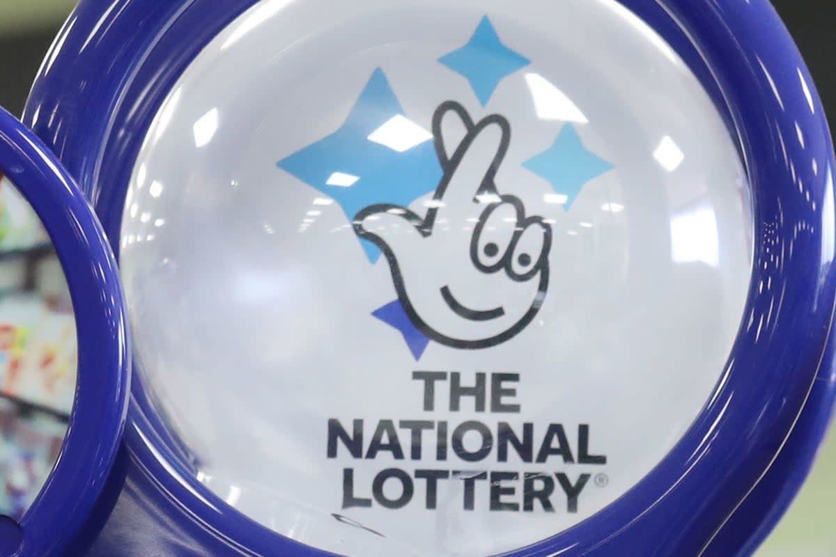 A lucky winner has scooped the £15m jackpot just before Christmas (PA Archive)