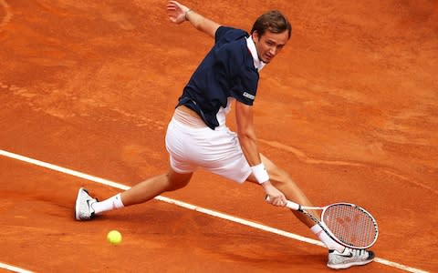 Daniil Medvedev of Russia plays a backhand against Nick Kyrgios of Australia in their first round match during day three of the International BNL d'Italia at Foro Italico on May 14, 2019 in Rome, Italy - Credit: Getty Images