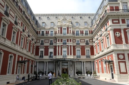 Members of the press are set up at the entrance of the Hotel du Palais in Biarritz