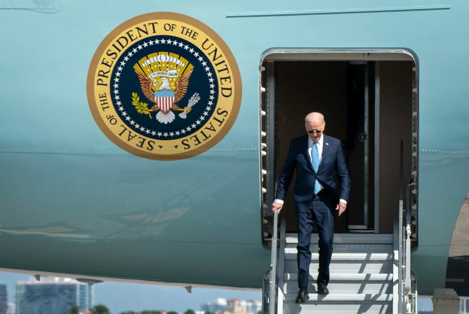 President Joe Biden arrives on Air Force One at Palm Beach International Airport to campaign in Florida on Jan. 30, 2024. Asked whether he holds Iran responsible for the deaths of three U.S. troops, he said: "I do hold them responsible in the sense that they're supplying the weapons to the people who did it."