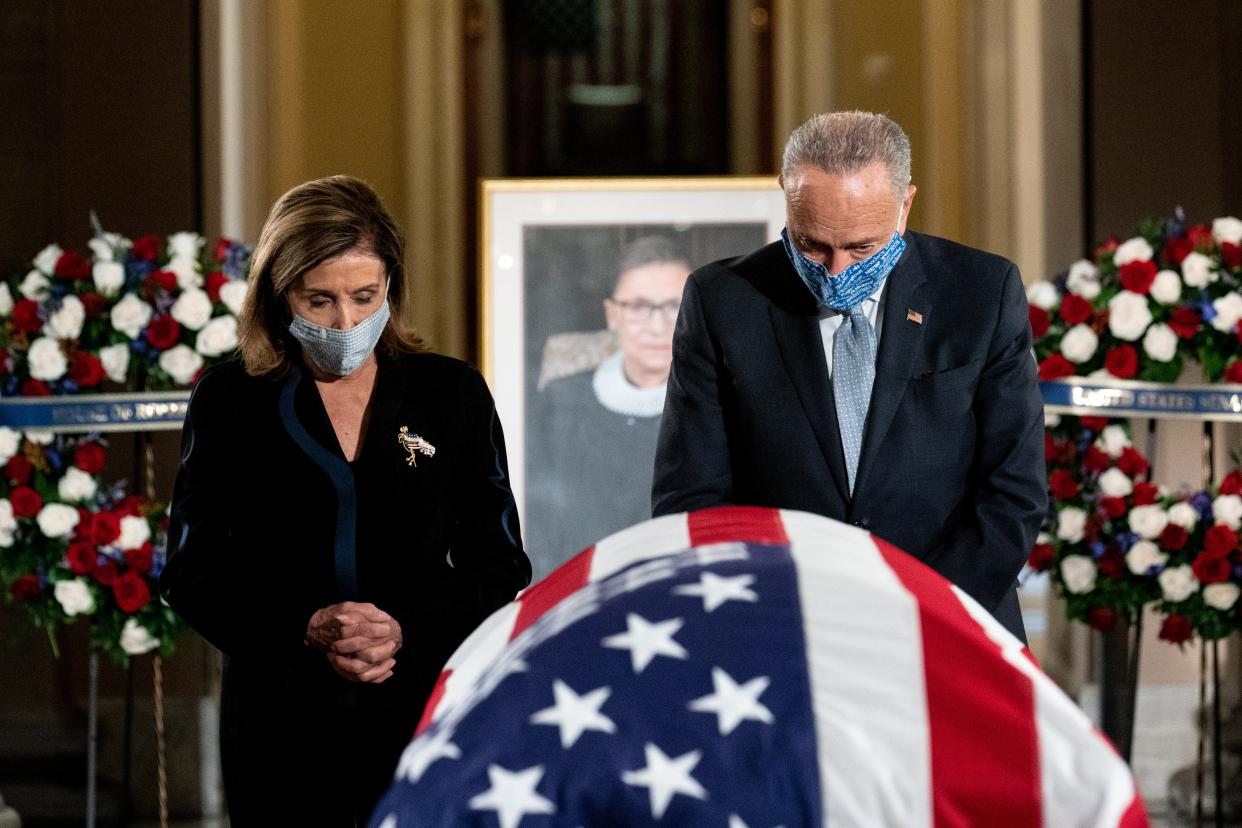 Chuck Schumer and Nancy Pelosi pay their respects to Ruth Bader Ginsburg at the US Capitol (REUTERS)