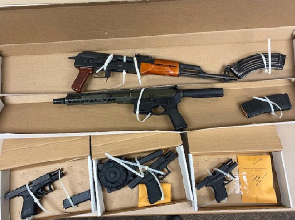 Automatic assault rifles and semiautomatic pistols were among weapons recovered by Akron police during an arrest after four people were seen shooting into a home in 2022. Gun violence remained high in 2023.