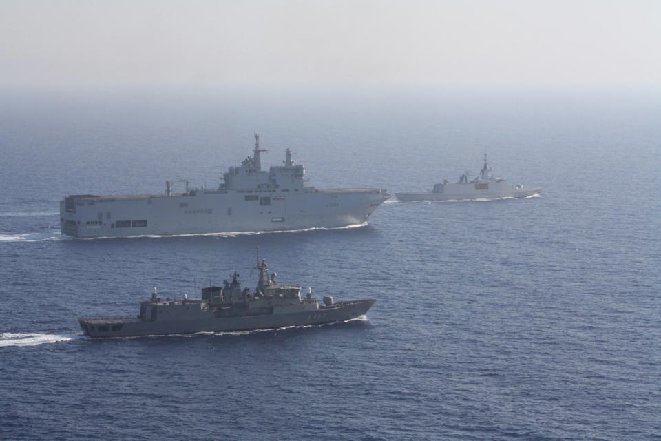 Image: Greek and French vessels sail in formation during a joint military exercise in Mediterranean sea (Greek Ministry of Defence / Reuters)