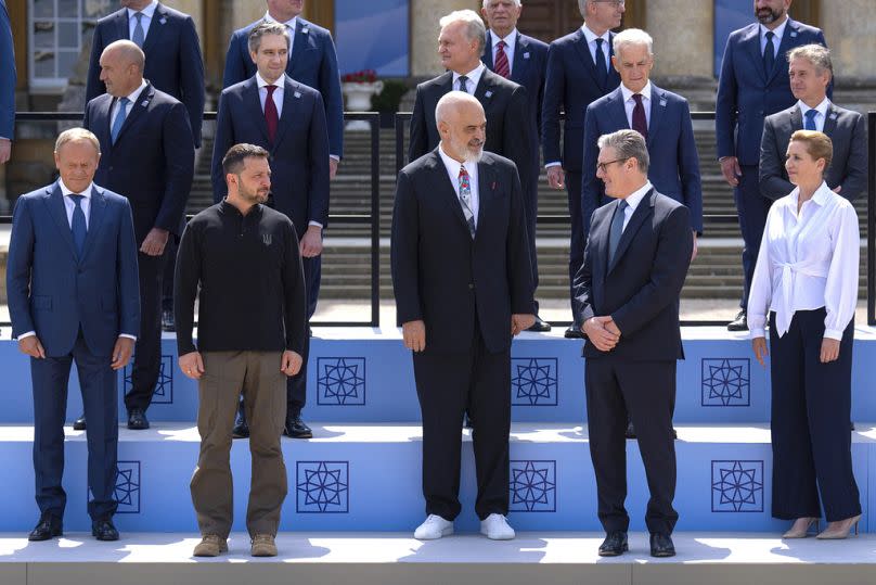 Britain's Prime Minister Keir Starmer, front second right, poses for a family photo with Europe's leaders during the European Political Community Summit at Blenheim Palace.