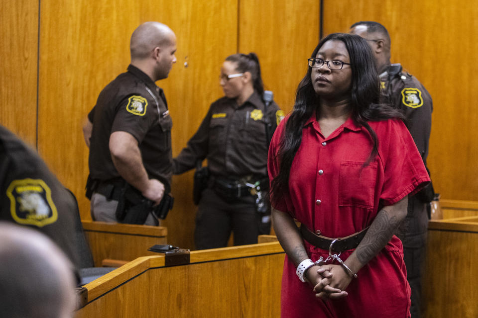 Kemia Hassel, 22, appears with her co-defendant, Jeremy Cuellar, 24, (not pictured) for a preliminary exam on a charge of first-degree premeditated murder at the Berrien County Courthouse in St. Joseph, Michigan on Wednesday, Feb. 20, 2019. U.S. Army Sgt. Tyrone Hassel III, 23, was killed on Dec. 31, 2018. A police investigation revealed the pair, Cuellar and Hassel were having an affair and plotted to killed Tyrone to continue their relationship and reap financial benefits resulting from his death. Cuellar was stationed at Fort Stewart in Georgia where Kemia and Tyrone were also stationed, where they lived with their 1-year-old child. (Joel Bissell/Kalamazoo Gazette via AP)