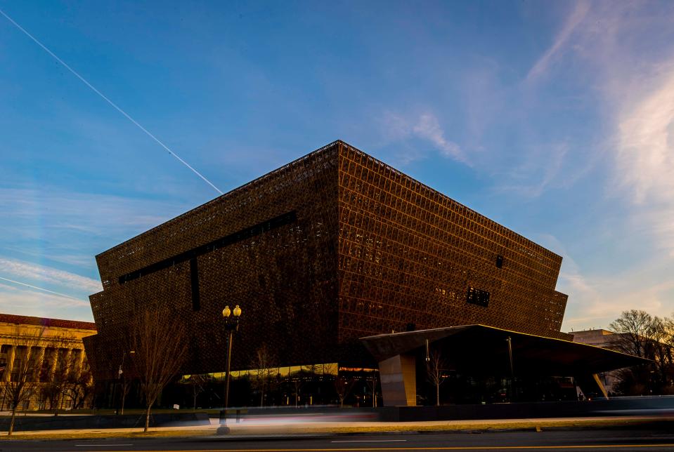 Facing the rising sun, the National Museum of African American History and Culture