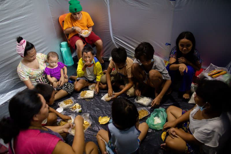 Metro Manila residents take shelter in evacuation centers following Typhoon Goni