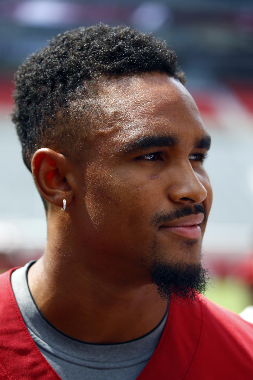 Alabama quarterback Jalen Hurts (2) speaks to media before a NCAA college football practice, Saturday, Aug. 4, 2018, in Tuscaloosa, Ala. (AP Photo/Butch Dill)