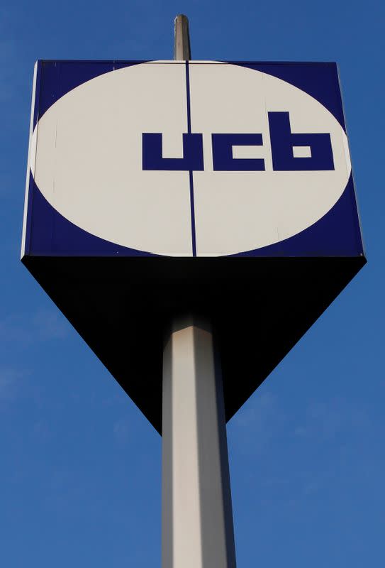 FILE PHOTO: The logo of UCB is seen at the entrance of the company's headquarters in Brussels