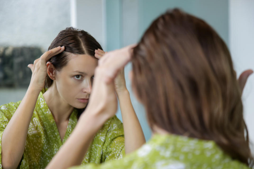 Many women experience hair loss and regrowth after pregnancy and birth. (Getty Images)