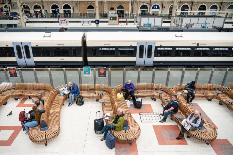 A few passengers wait at Victoria station in London (Dominic Lipinski/PA) (PA Wire)