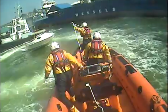 Lifeboat crew lasso runaway speedboat in Devon harbour (video)