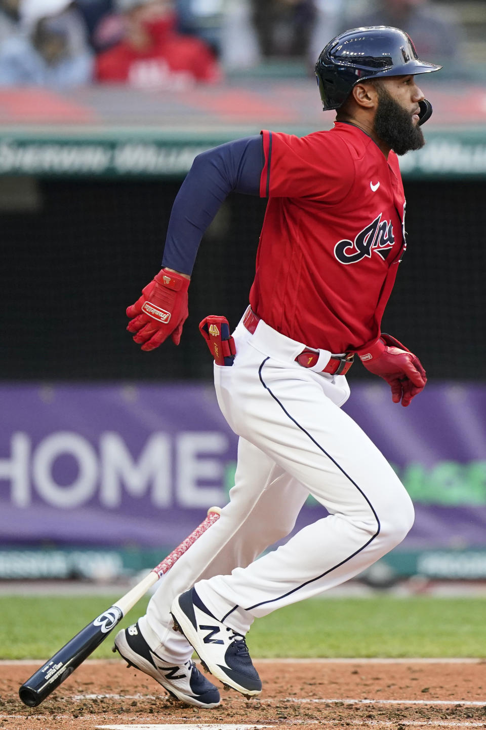 Cleveland Indians' Amed Rosario watches his RBI-single in the first inning of a baseball game against the New York Yankees, Friday, April 23, 2021, in Cleveland. (AP Photo/Tony Dejak)