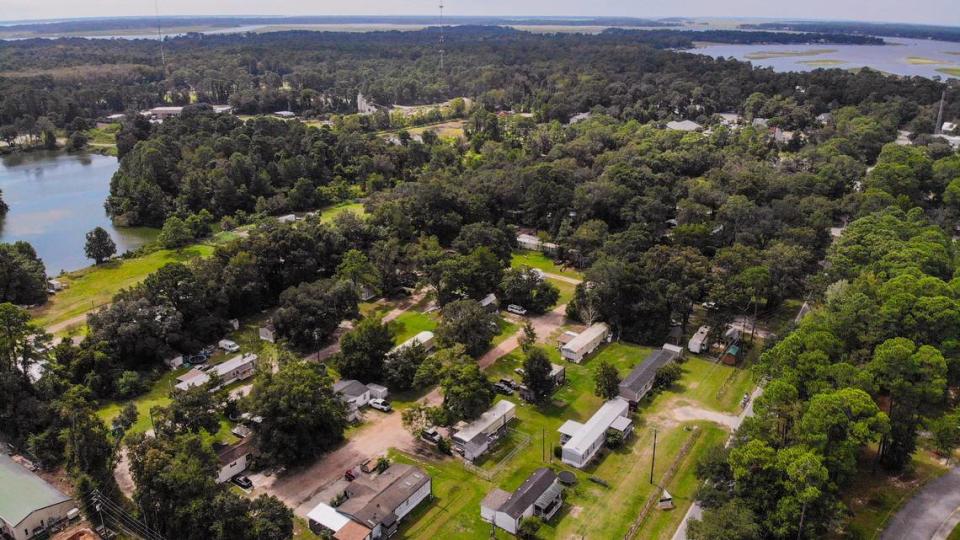 With the May River bends and twists evident at the top of this drone photo, pictured in center is a mobile home park on Burnt Church Road photographed on Sept. 21, 2023 and is listed for sale for $3.5 million in Old Town Bluffton.