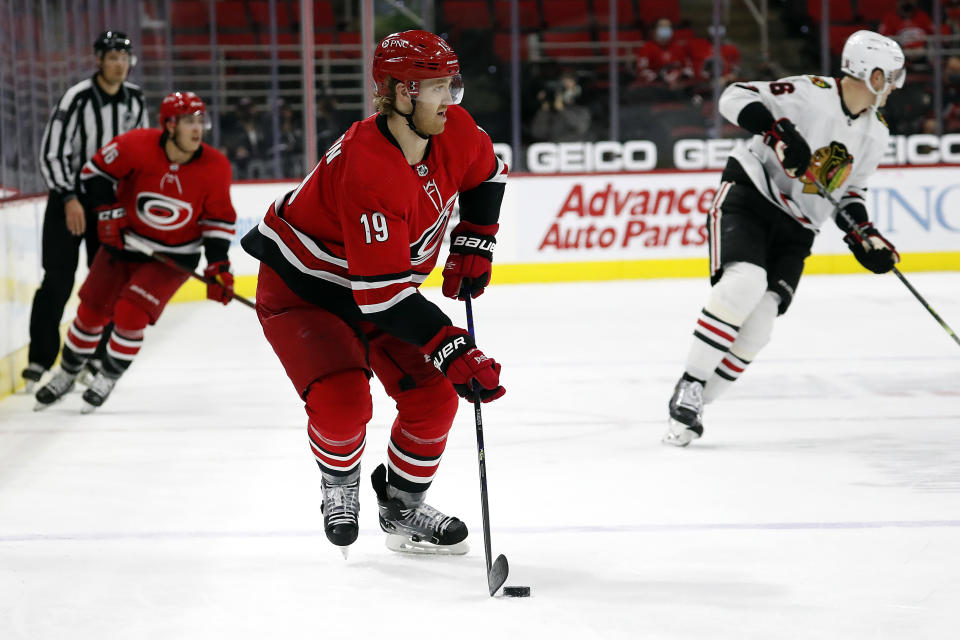 FILE - In this May 6, 2021, file photo, Carolina Hurricanes' Dougie Hamilton (19) skates with the puck against the Chicago Blackhawks during the third period of an NHL hockey game in Raleigh, N.C. Hamilton would be among the most coveted free agents. He's a 28-year-old right-shooting defenseman who can produce offensively. (AP Photo/Karl B DeBlaker, File)