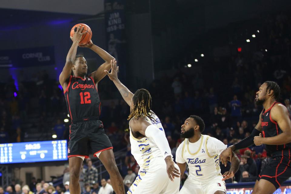 Tulsa's Bryant Selebangue tries to defend Houston's Tramon Mark in an AAC game in December. Selebangue leads the AAC in rebounding.