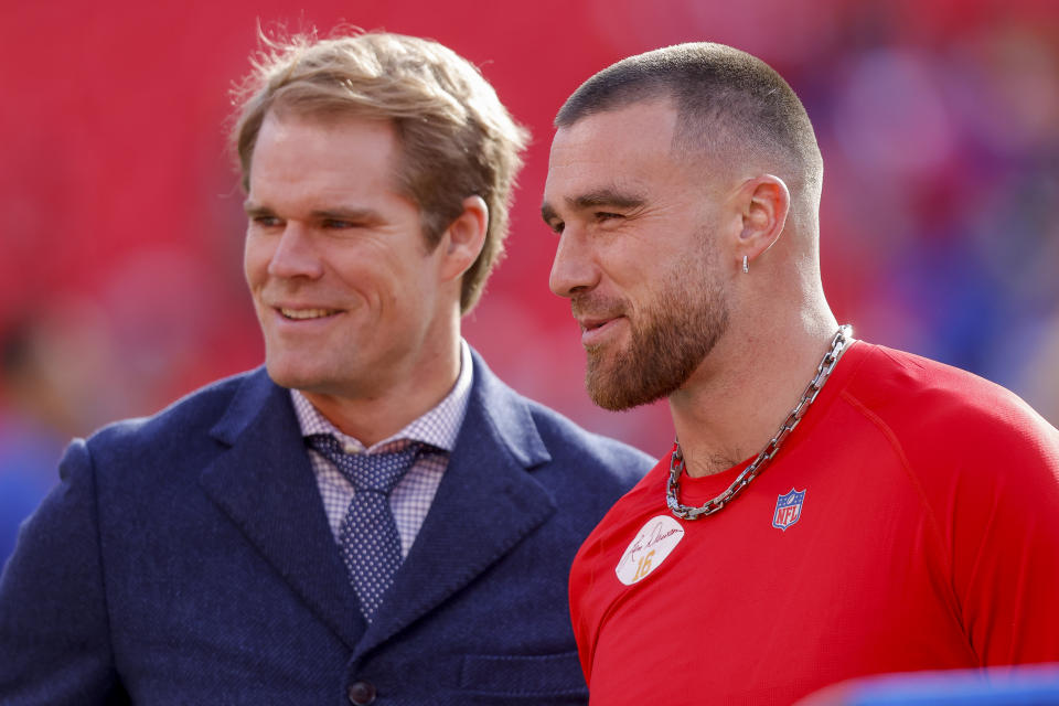 KANSAS CITY, MO - NOVEMBER 27: Travis Kelce #87 of the Kansas City Chiefs and Fox Sports broadcaster Greg Olsen speak during pregame warmups prior to the game against the Los Angeles Rams at Arrowhead Stadium on November 27, 2022 in Kansas City, Missouri. (Photo by David Eulitt/Getty Images)