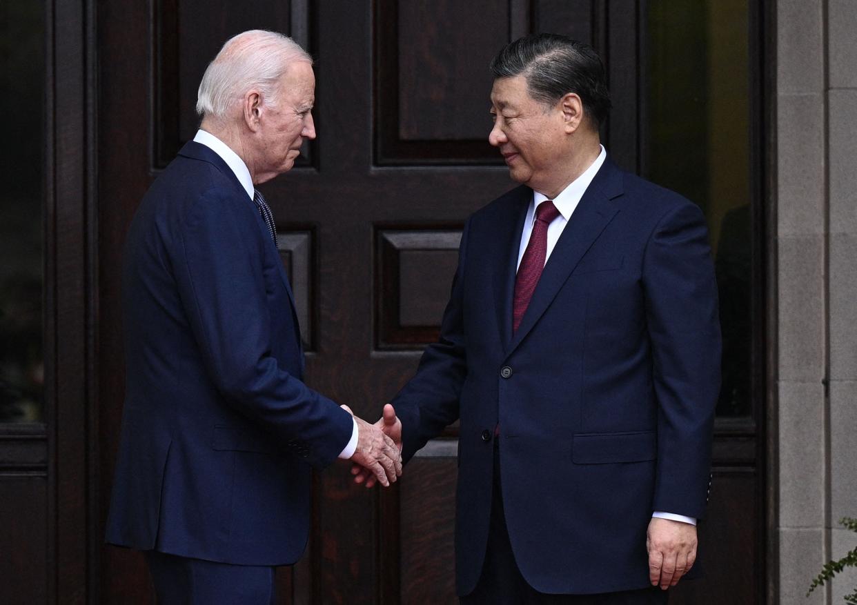 US President Joe Biden greets Chinese President Xi Jinping before a meeting during the Asia-Pacific Economic Cooperation (APEC) Leaders' week in Woodside, California on November 15, 2023. Biden and Xi will try to prevent the superpowers' rivalry spilling into conflict when they meet for the first time in a year at a high-stakes summit in San Francisco on Wednesday. With tensions soaring over issues including Taiwan, sanctions and trade, the leaders of the world's largest economies are expected to hold at least three hours of talks at the Filoli country estate on the city's outskirts.