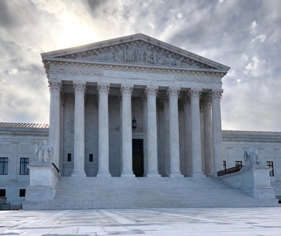 The rising sun shines over the Supreme Court building on Capitol Hill in Washington, Monday morning, May 11, 2020. (AP Photos/Mark Sherman)