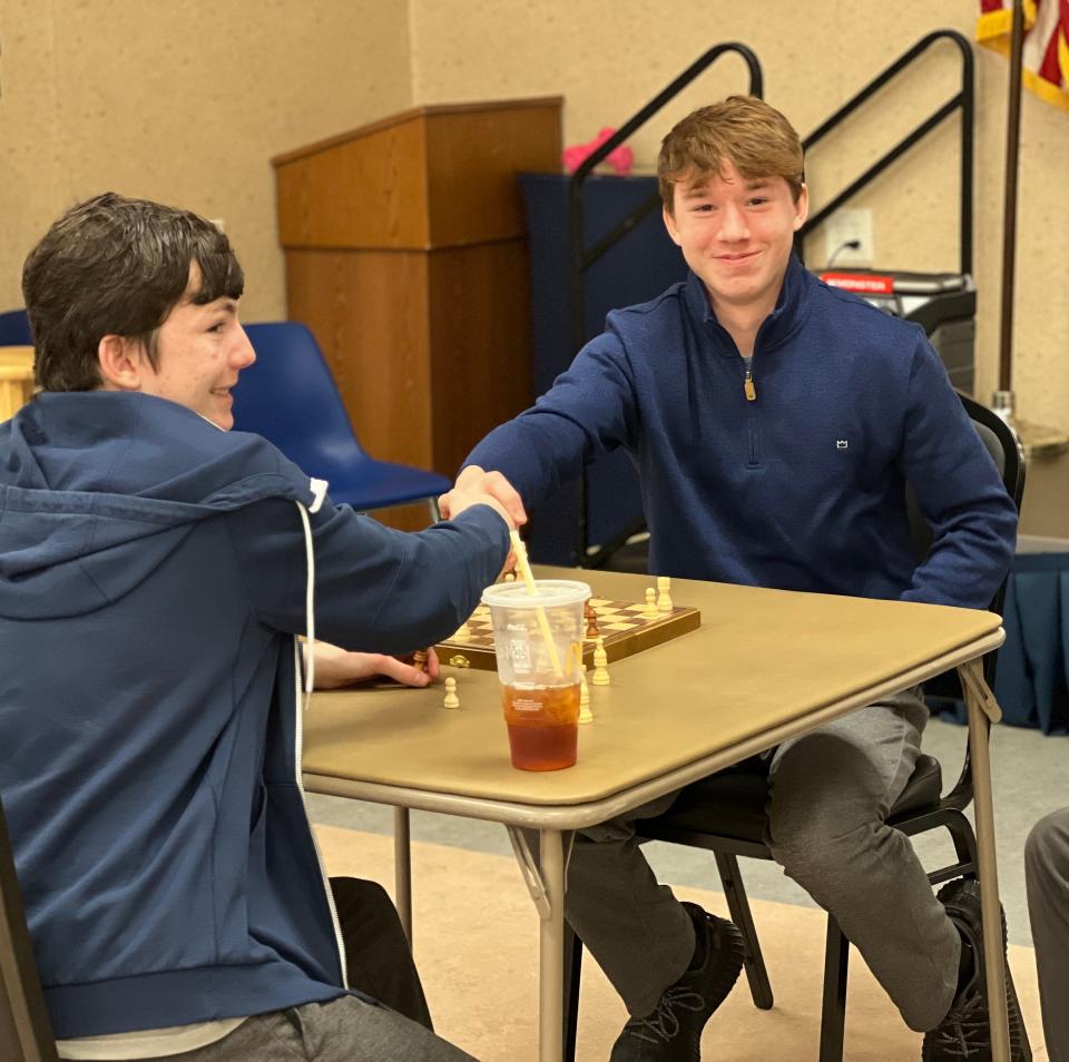 Ramsey Stiles, far right, has organized Gaston Chess, which meets 6:30 p.m. Tuesdays at Gaston Senior Center, Dallas. Here Stiles takes on Colin Chilton during a chess match.