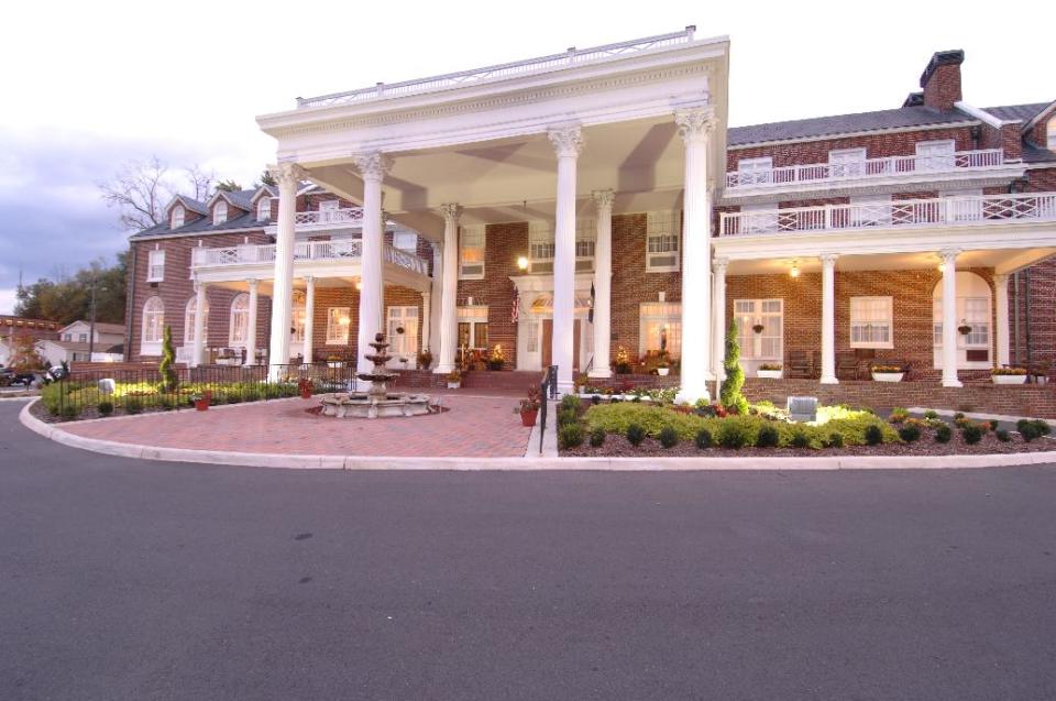 This undated photo provided by The Mimslyn Inn in Luray, Va., shows the lobby of the 82-year-old inn, which was closed for a year in 2007 while undergoing a $3.5 million renovation, including a complete mechanical and cosmetic upgrade. It's important to do your homework when planning a stay at a historic hotel or inn, because while some like The Mimslyn have modernized, others may count on their history or location to appeal to guests who don't mind rustic or old-fashioned accommodations. (AP Photo/Mimsyln Inn)