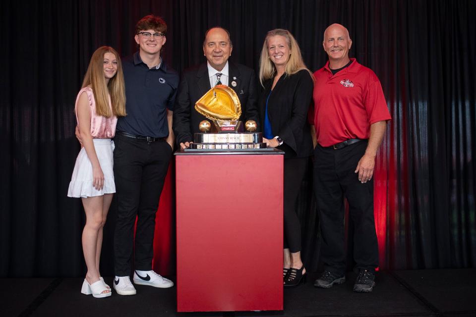 Top Ohio high school catcher Jimmy Nugent of Badin with his family as he's presented the Johnny Bench Award from the Hall of Famer, No. 5 himself.