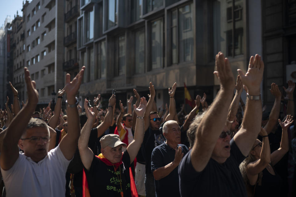 Members and supporters of National Police and Guardia Civil march during a protest demanding better pay in Barcelona, Spain, Saturday, Sept. 29, 2018. (AP Photo/Felipe Dana)