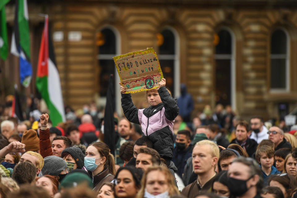 GLASGOW, SCOTLAND - NOVEMBER 05: People are seen gathered on George Square during a rally on November 5, 2021 in Glasgow, Scotland. Day Six of the 2021 climate summit in Glasgow will focus on youth and public empowerment. Outside the COP26 site, on the streets of Glasgow, the 