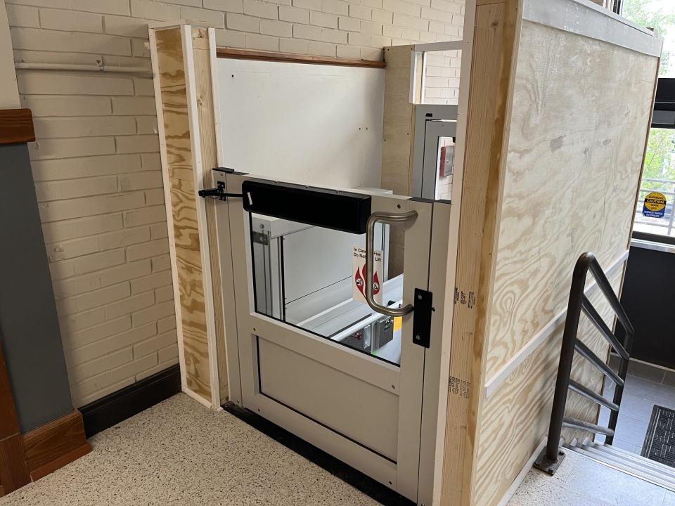 A new wheelchair lift inside the ADA accessible entrance at the Washington School Apartments in Sheboygan, as seen May 14.