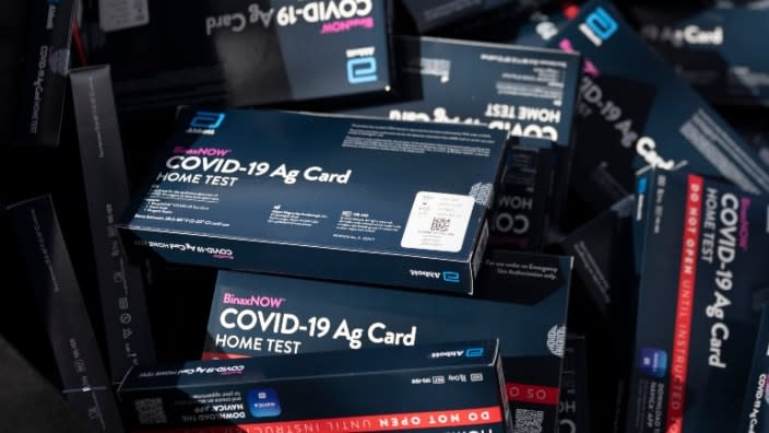 COVID-19 at-home rapid test kits are given away during a drive-thru event on Dec. 30 in Hollywood, Florida, where Broward County distributed a limited supply of the kits to residents while supplies lasted. (Photo: Joe Raedle/Getty Images)