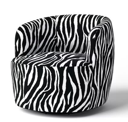 A zebra-print swivel chair