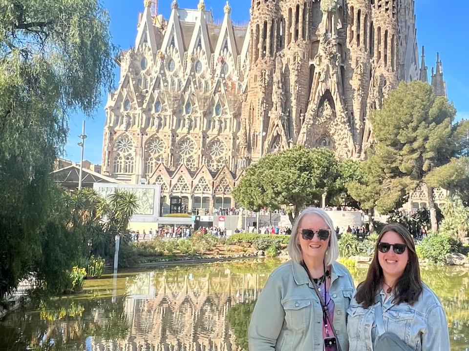 The author and her mother in front of the Sagrada Familia in Spain.