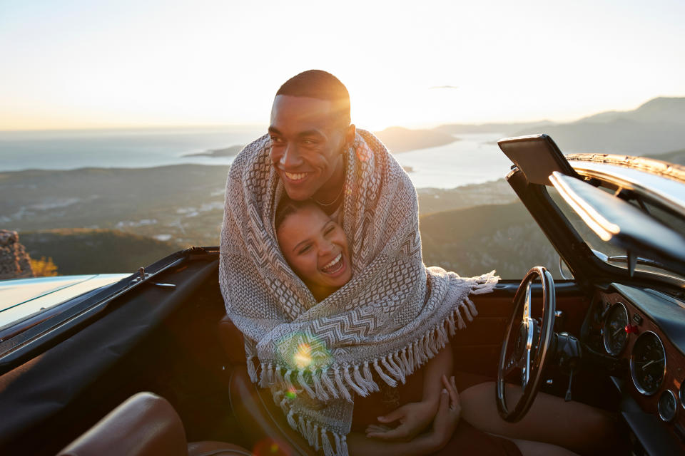 couple hugging in a car