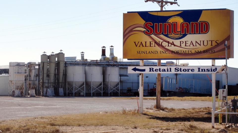 File-This Nov. 27, 2012 file photo shows the Sunland Inc. peanut butter and nut processing plant in eastern New Mexico, near Portales. Nearly a million jars of peanut butter are being dumped at a New Mexico landfill to expedite the sale of Sunland Inc. the bankrupt peanut-processing plant that was at the heart of a 2012 salmonella outbreak and nationwide recall. (AP Photo/Jeri Clausing)