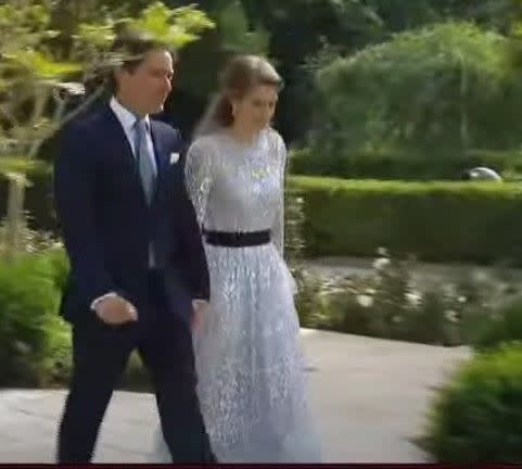 Princess Beatrice wearing blue needle and thread dress holding hands with edoardo mapelli mozzi