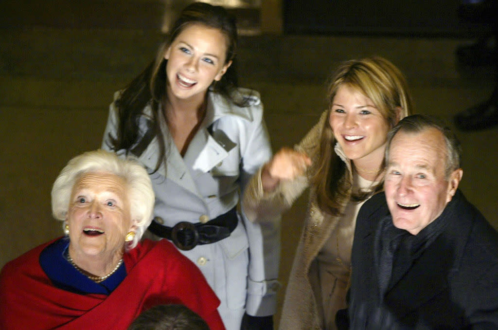 President George H.W. Bush, right, and his wife Barbara, left, and granddaughters Barbara Bush, at rear left, and Jenna Bush Hager, in Washington, D.C., on January 20, 2005. (Photo: Getty)