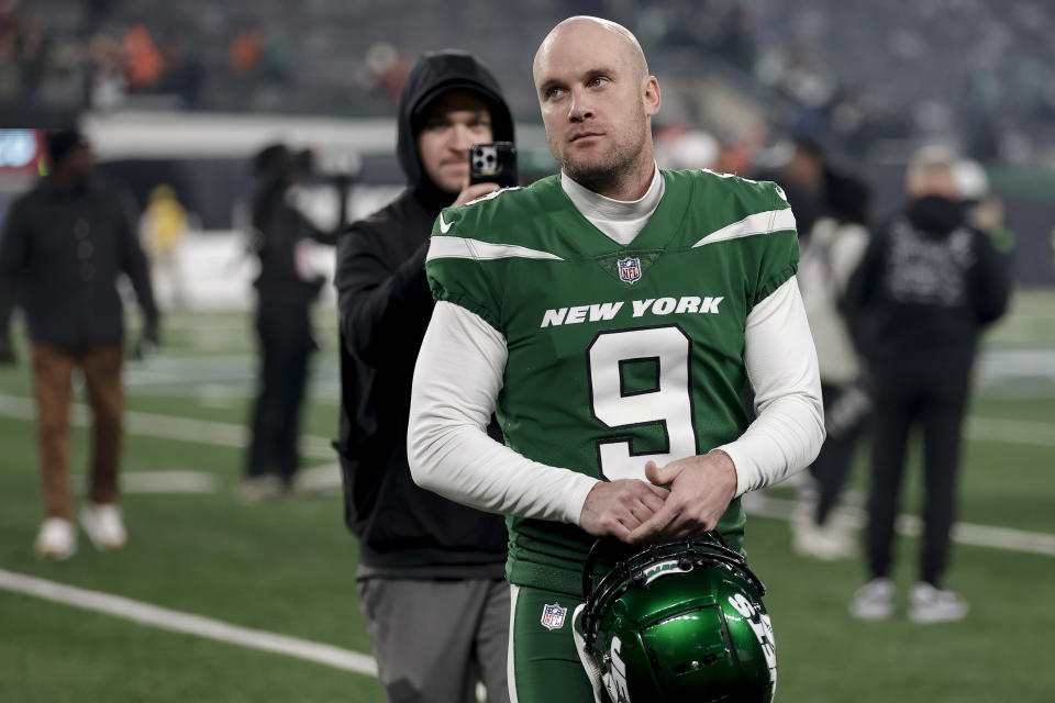 New York Jets place kicker Greg Zuerlein (9) walks off the field after playing in an NFL football game against the Washington Commanders, Sunday, Dec. 24, 2023, in East Rutherford, N.J. (AP Photo/Adam Hunger)