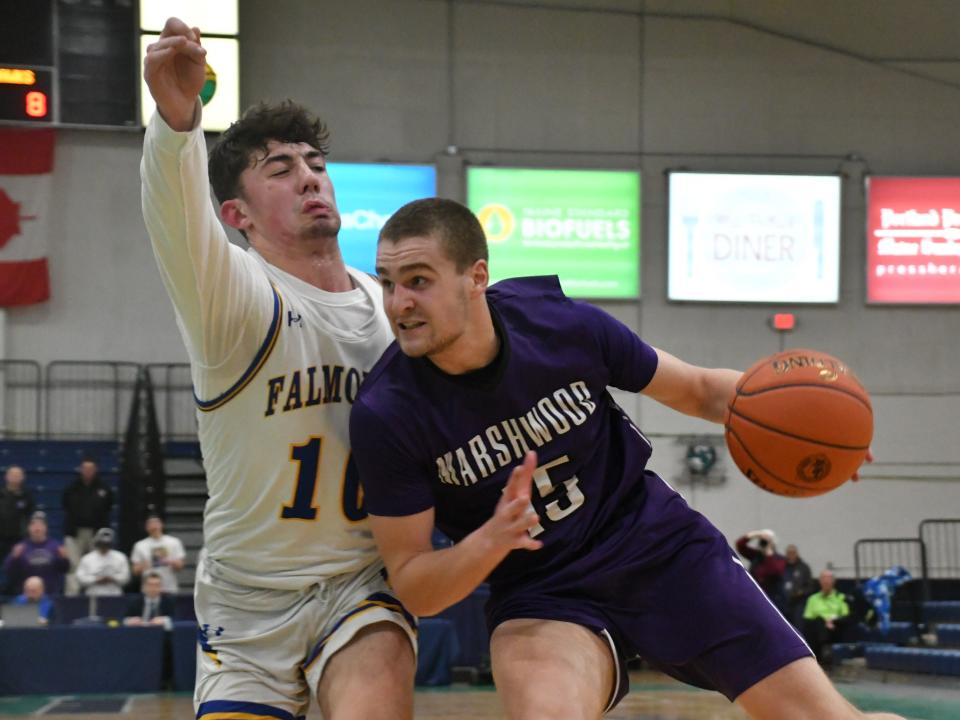 Marshwood’s Andrew Perry, right, looks to move past Falmouth’s Peyton Mitchell during the Class A South championship game Friday night at the Portland Expo. Marshwood lost in the regional final for the second year in a row, 40-31