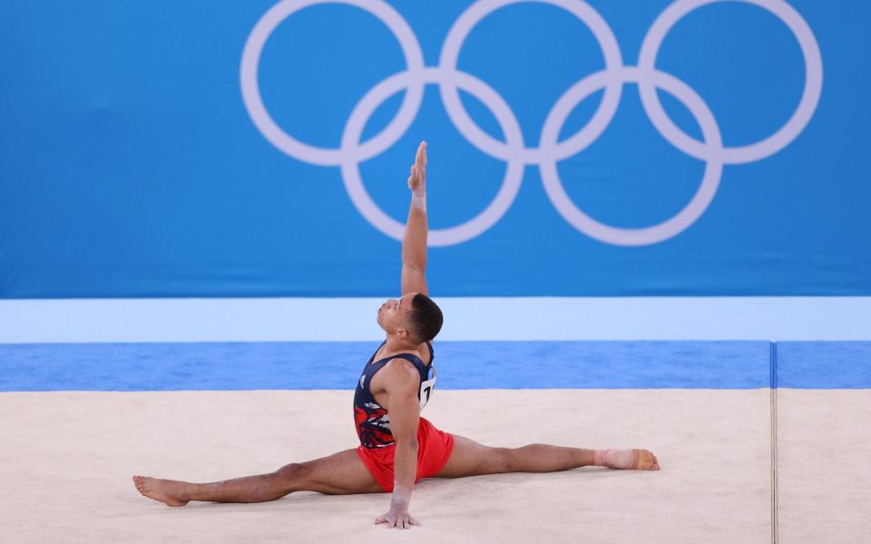 Joe Fraser of Team Great Britain competes in the floor exercise during the Men's All-Around Final on day five of the Tokyo 2020 Olympic Games at Ariake Gymnastics Centre on July 28, 2021 in Tokyo, Japan. (Photo by David Ramos/Getty Images)