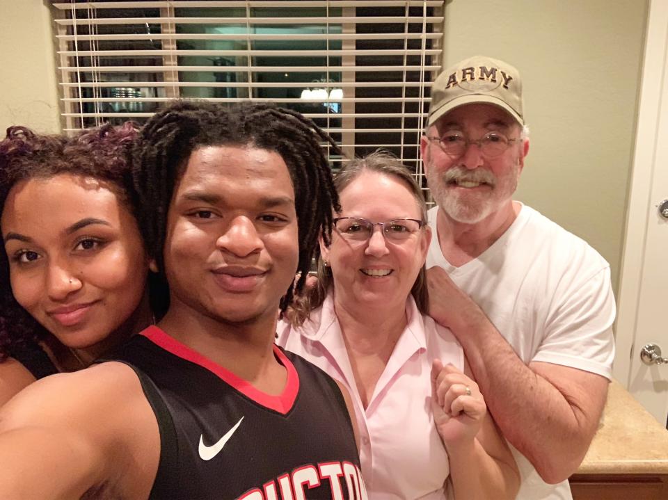 Jamal Hinton and his girlfriend, Mikaela, pictured with Wanda and Lonnie Dench.