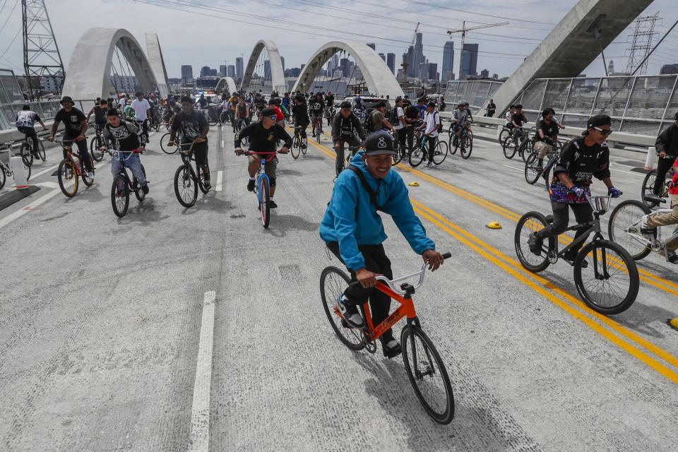 Members of Goon Ride gather midspan on the 6th Street Viaduct causing police to shut the bridge down.