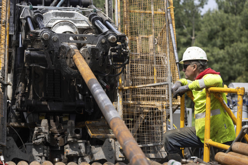 Driller Chris Palmer keeps watch over a drilling rig at the Talon Metals Corporation site near Tamarack, Minn. on Wednesday, June 7, 2023. Talon Metals Corp. has filed papers with Minnesota regulators to launch the environmental review process for its proposed underground nickel mine near the town of Tamarack in northern Minnesota. (Ben Hovland/Minnesota Public Radio via AP)