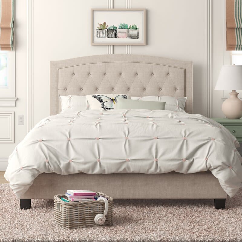 Pascal Tufted Upholstered Low Profile Standard Bed. Image via Wayfair.