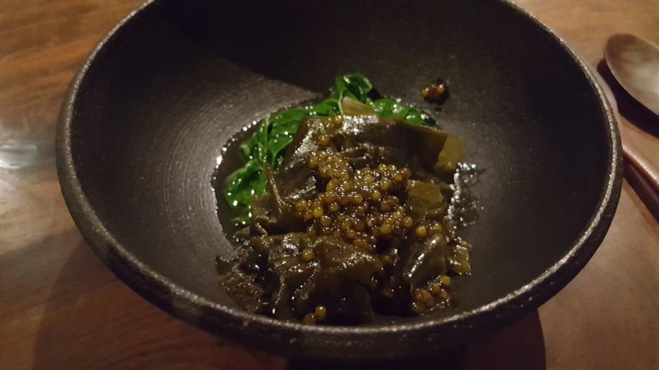 <p>“Up next, baby spinach, roasted kelp cooked in clarified butter (compliments of their jersey cow Bella) and topped with proprietary caviar – some specific type that you can only have there.” <em>[Photo: Imgur] </em> </p>