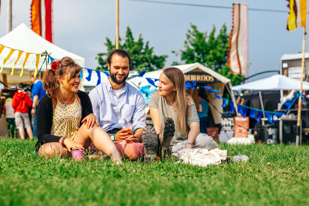 Festival goers chat at the real-life version of the experience