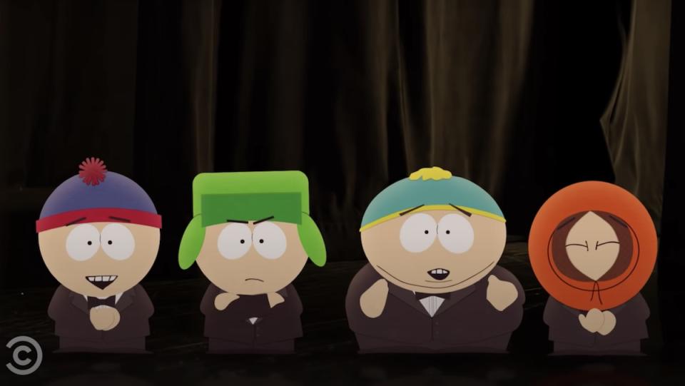 The four South Park boys dressed in tuxedoes for the Broadway orchestral version of "Kyle's Mom" 